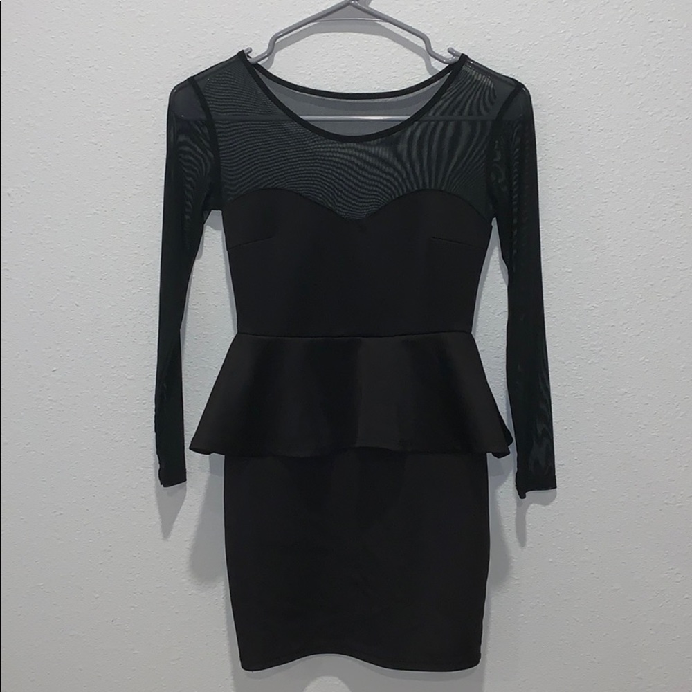 Black peplum dress by Charlotte Russe
